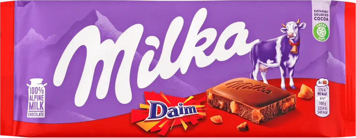 Шоколад Milka молочний з шматочками хрусткої карамелі і мигдалем 100г